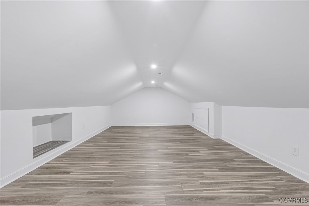 9232 Groomfield Road Chesterfield, VA 23236 - Photo 35 of 50 a view of an empty room with wooden floor