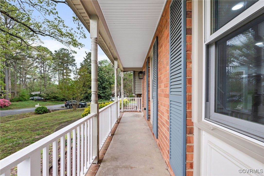 9232 Groomfield Road Chesterfield, VA 23236 - Photo 4 of 50 a view of a house with a yard and porch