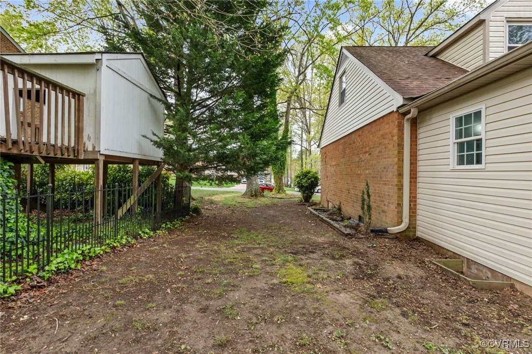 9232 Groomfield Road Chesterfield, VA 23236 - Photo 45 of 50 a view of a house with backyard and garden