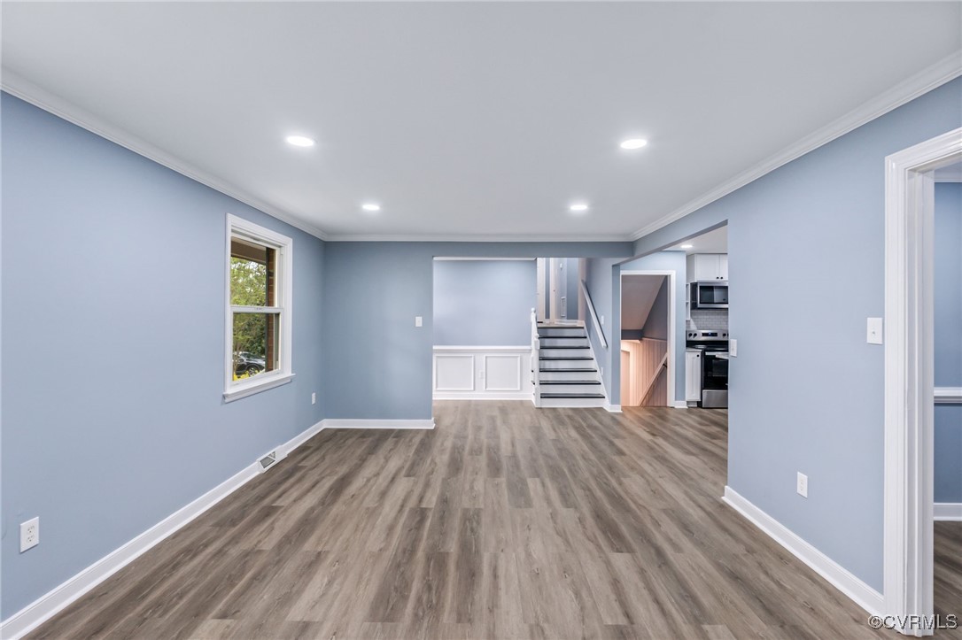 9232 Groomfield Road Chesterfield, VA 23236 - Photo 7 of 50 a view of empty room with wooden floor and window