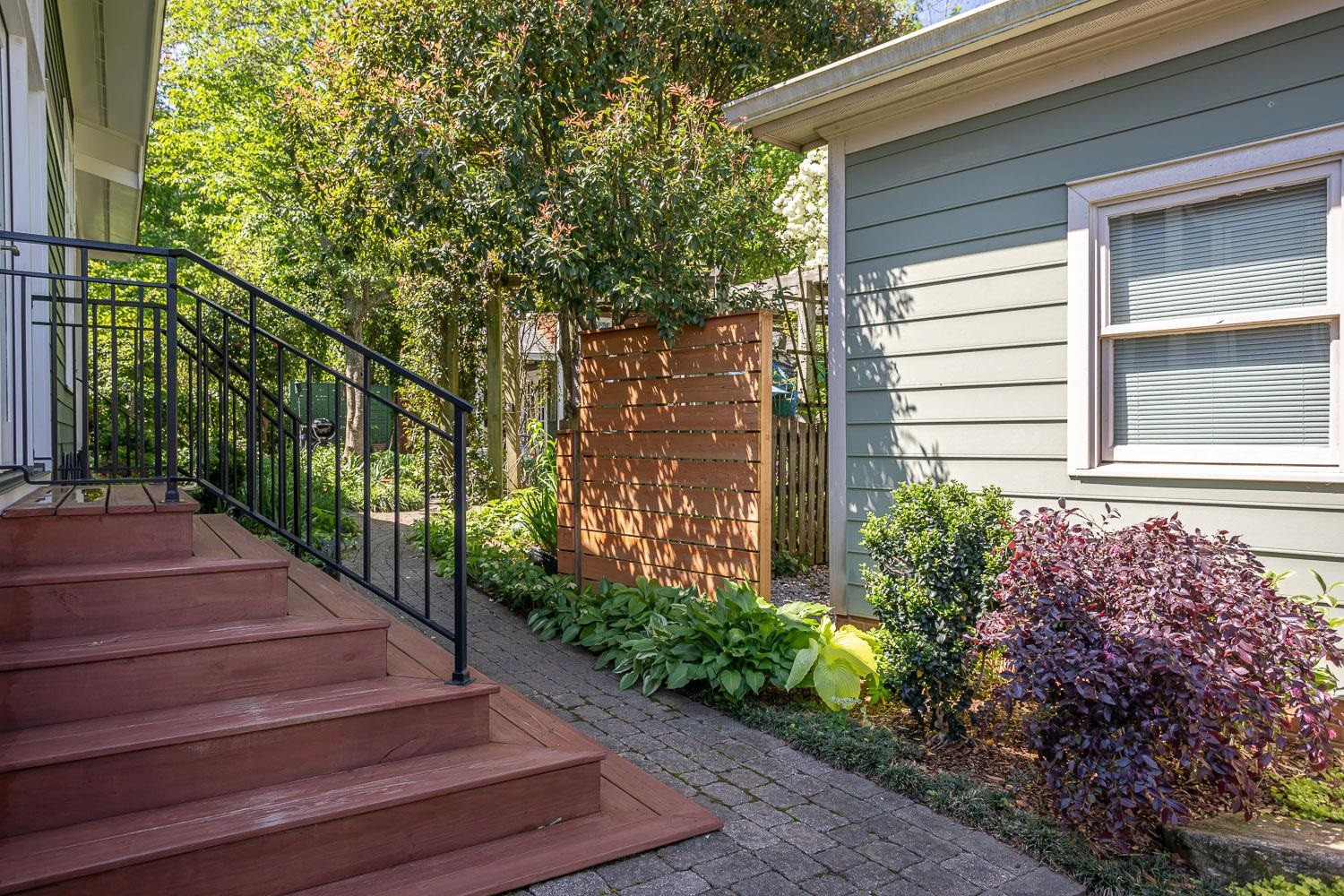 601 Leonidas Court Raleigh, NC 27604 - Photo 34 of 53 Custom steps from Art Studio to back garden