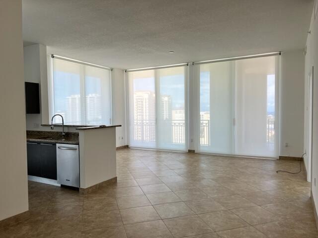 550 Okeechobee Boulevard, Unit MPH02 West Palm Beach, FL 33401 - Photo 9 of 32 a view of a kitchen with a sink
