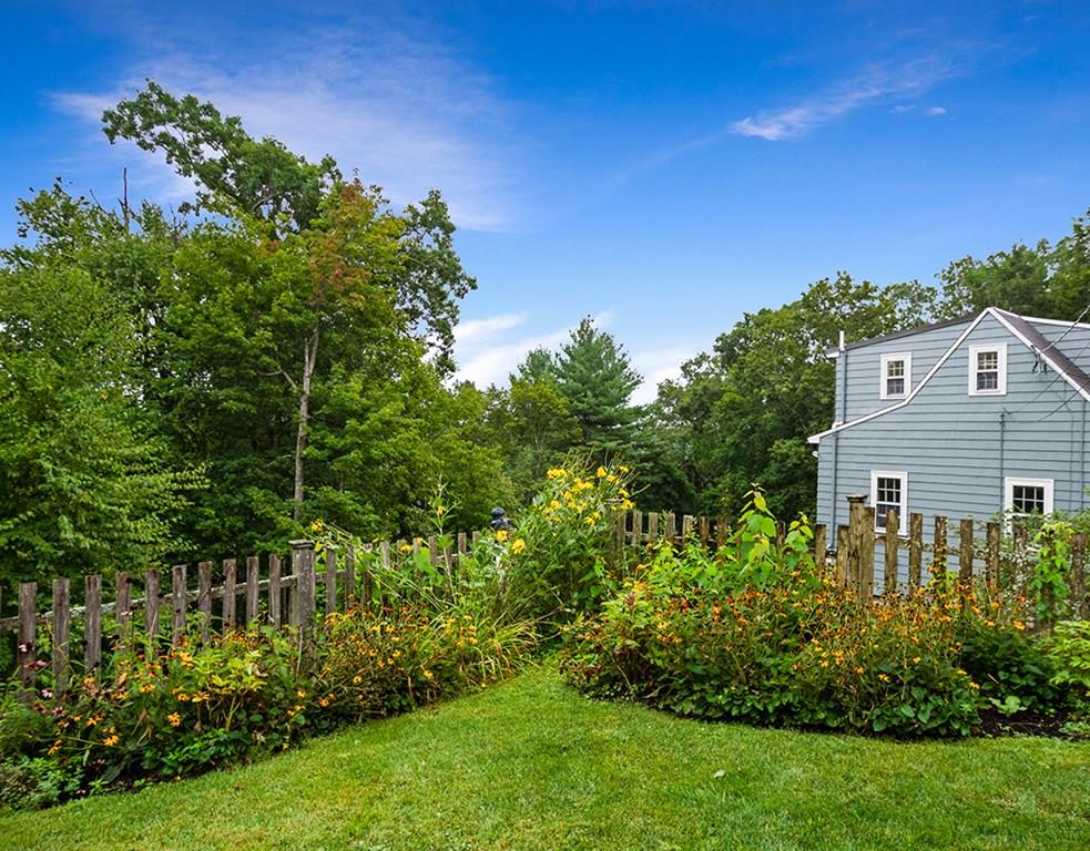 14 Hilliard Road Lincoln, MA 01773 - Photo 25 of 31 a view of a house with a backyard