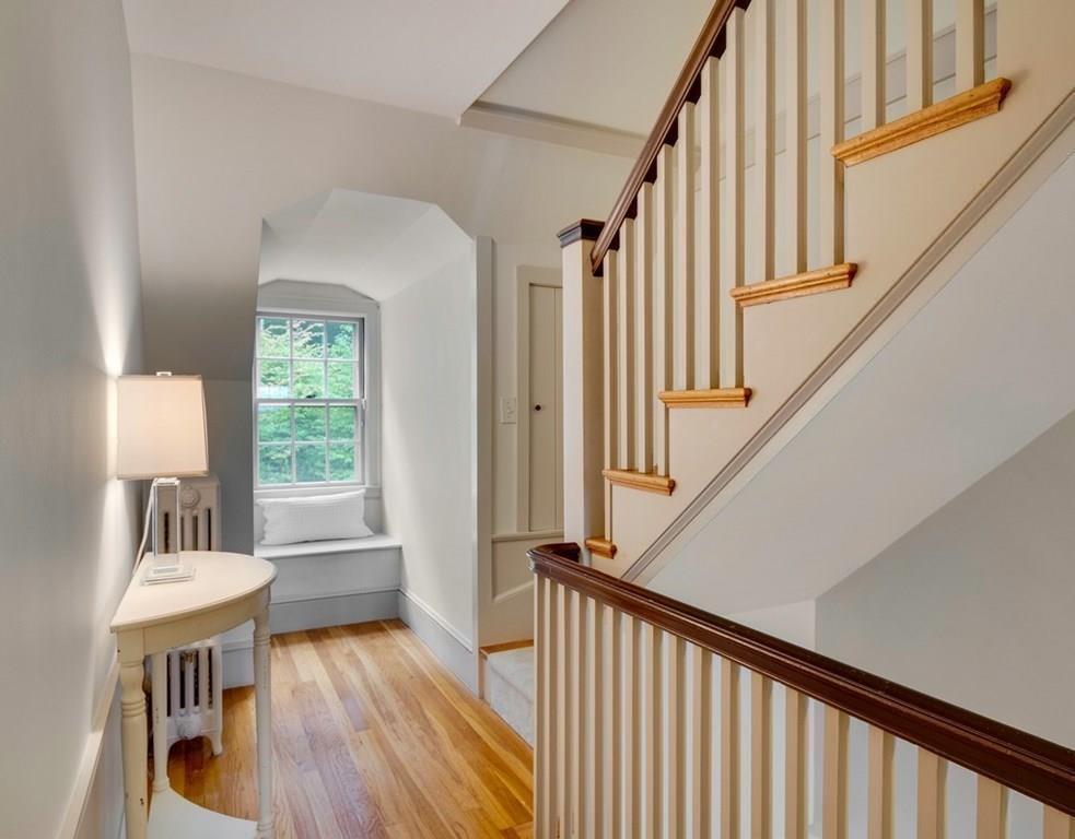 14 Hilliard Road Lincoln, MA 01773 - Photo 8 of 31 a view of entryway with wooden floor and dining room
