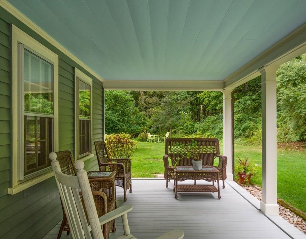 14 Hilliard Road Lincoln, MA 01773 - Photo 10 of 31 a balcony with furniture and garden