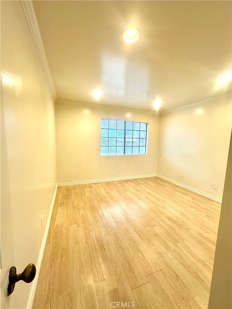 9356 19th Street, Unit A Rancho Cucamonga, CA 91701 - Photo 14 of 23 a view of an empty room and a window