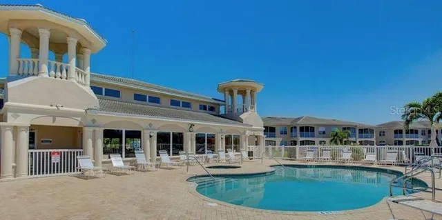 a view of a building with a swimming pool