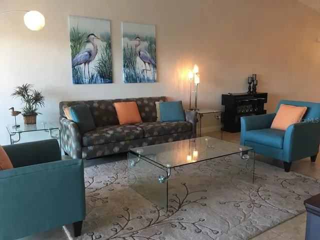 a living room with furniture and a couch