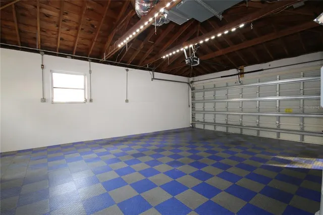 a view of empty room with windows