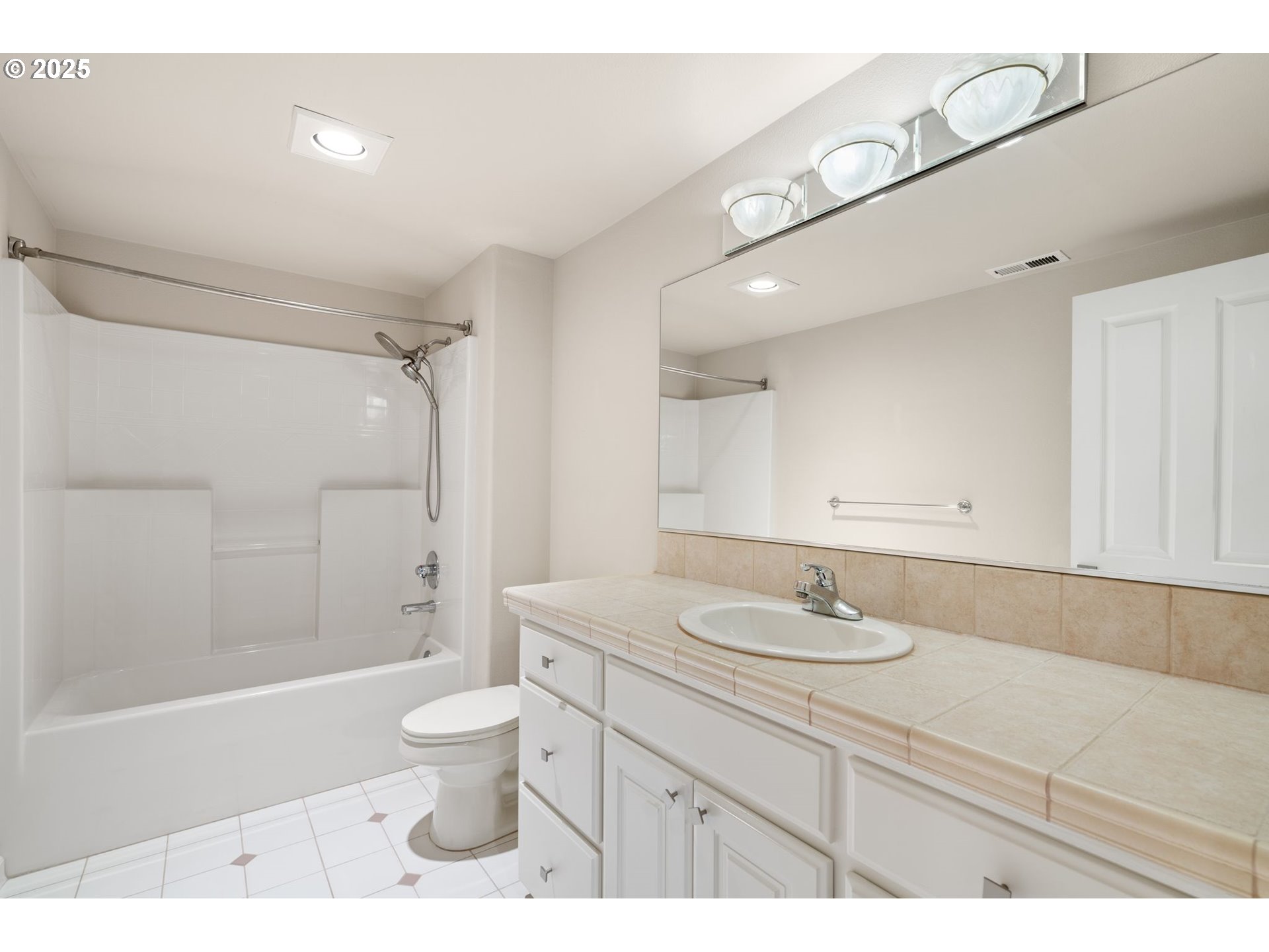 1925 Hall Street West Linn, OR 97068 - Photo 15 of 28 a bathroom with a granite countertop sink a toilet and shower
