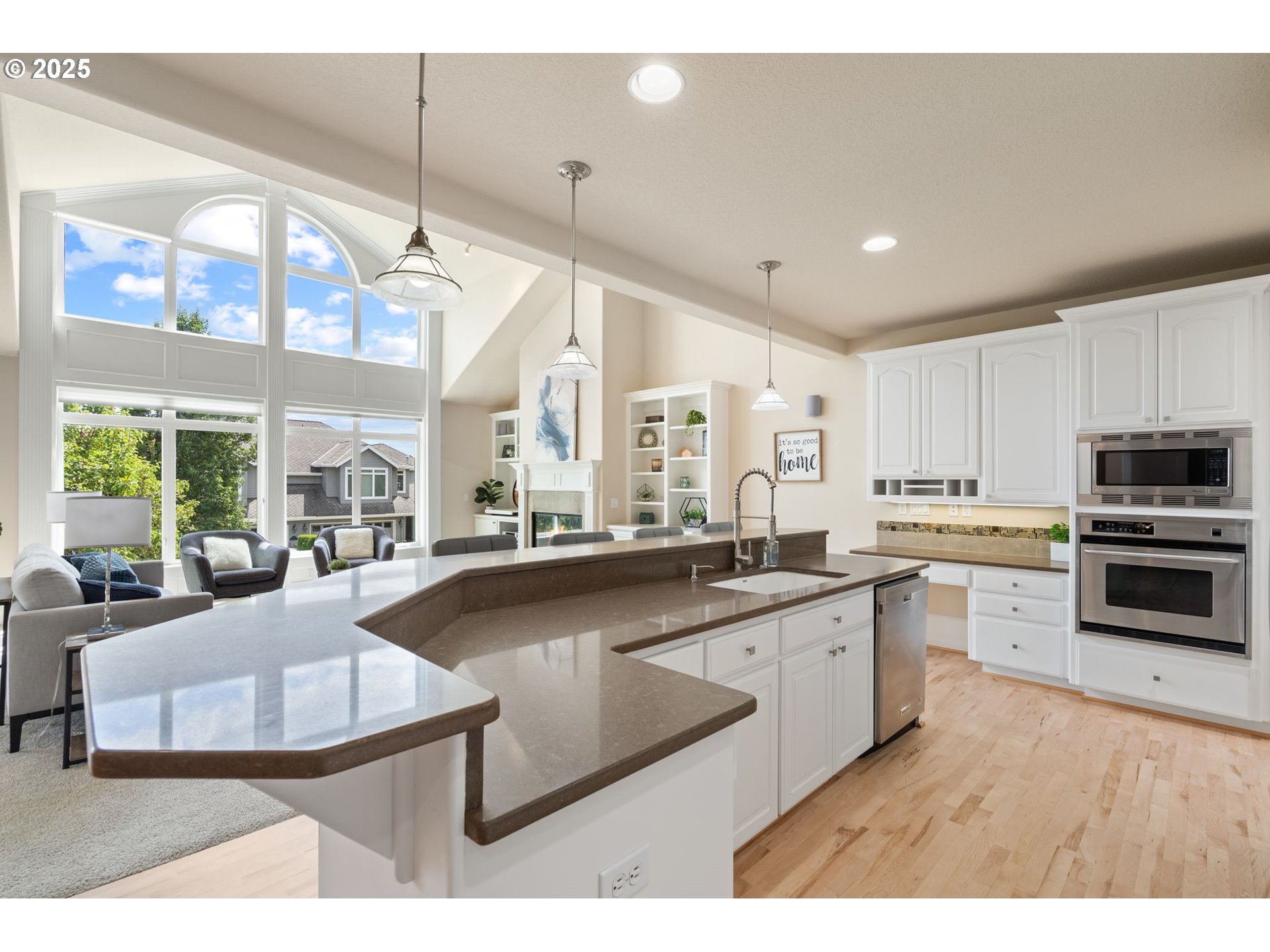 1925 Hall Street West Linn, OR 97068 - Photo 6 of 28 a large kitchen with kitchen island a large window a sink and stainless steel appliances