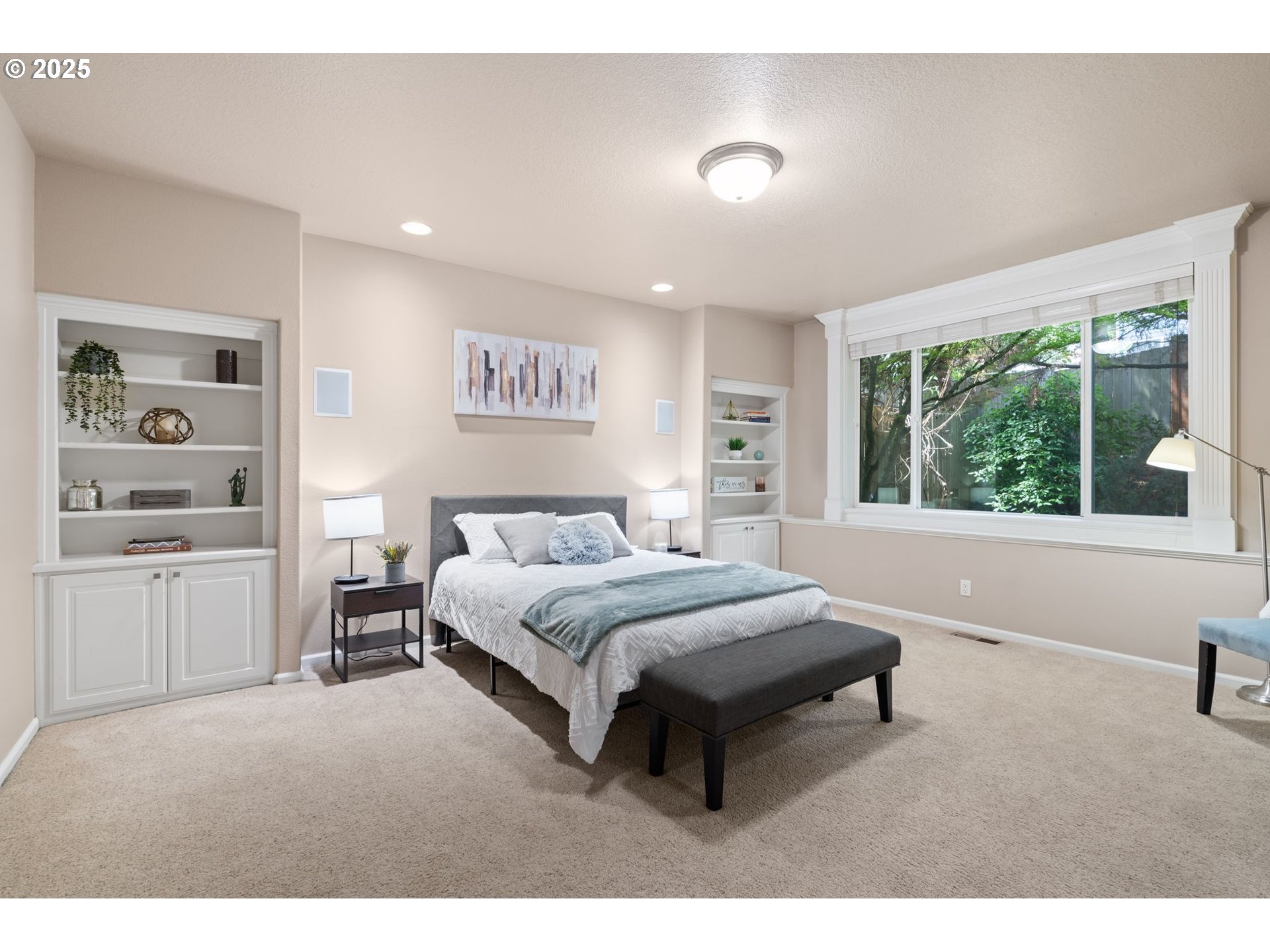 1925 Hall Street West Linn, OR 97068 - Photo 9 of 28 a spacious bedroom with a bed and a large window