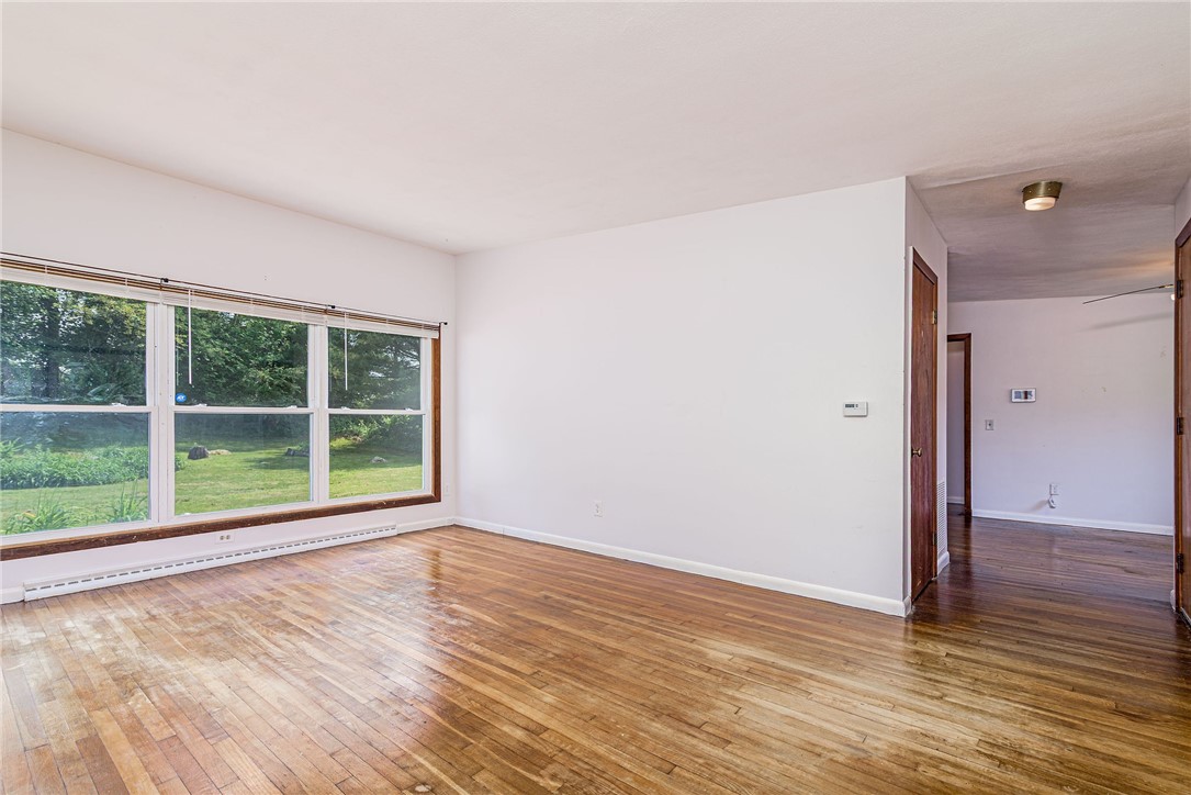 7 Stuart Street Westerly, RI 02891 - Photo 13 of 44 Back through living room to the dining room