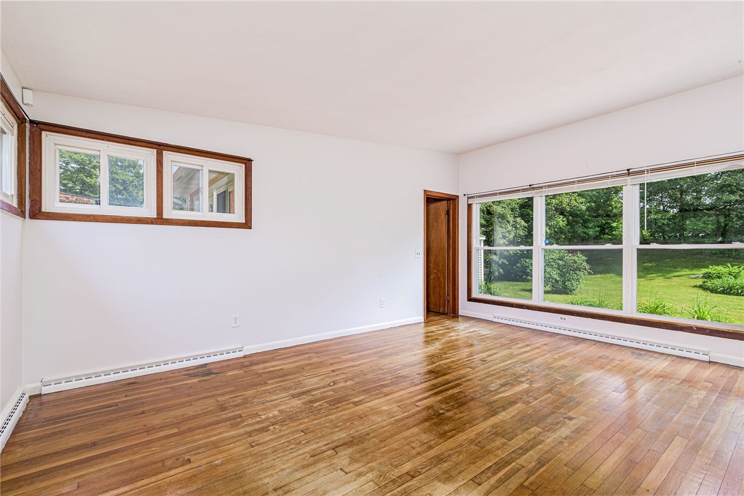 7 Stuart Street Westerly, RI 02891 - Photo 9 of 44 Living room view , door to bedroom