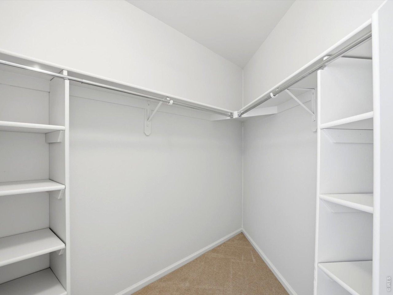 4945 Twin Lakes Road, Unit 46 Boulder, CO 80301 - Photo 30 of 42 The oversized walk-in closet provides exceptional storage with built-in shelving and hanging space.