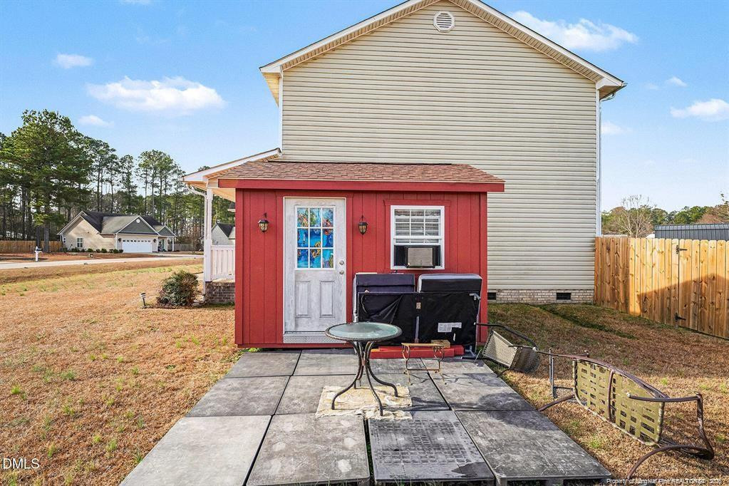 831 Raspberry Road Stedman, NC 28391 - Photo 30 of 35 a house view with a outdoor space