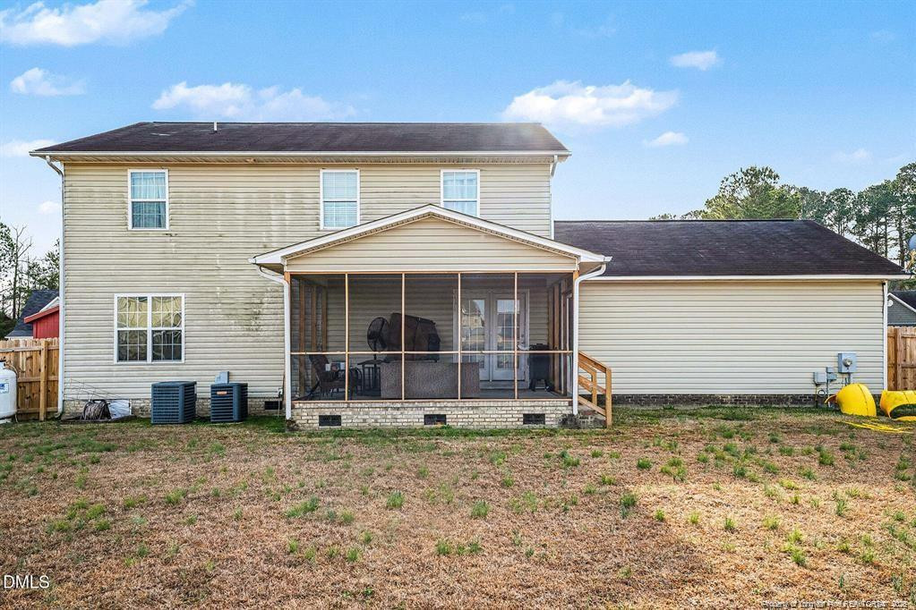 831 Raspberry Road Stedman, NC 28391 - Photo 32 of 35 a front view of a house with a yard