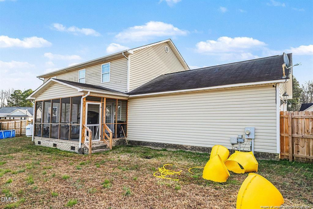 831 Raspberry Road Stedman, NC 28391 - Photo 33 of 35 a view of house with a backyard