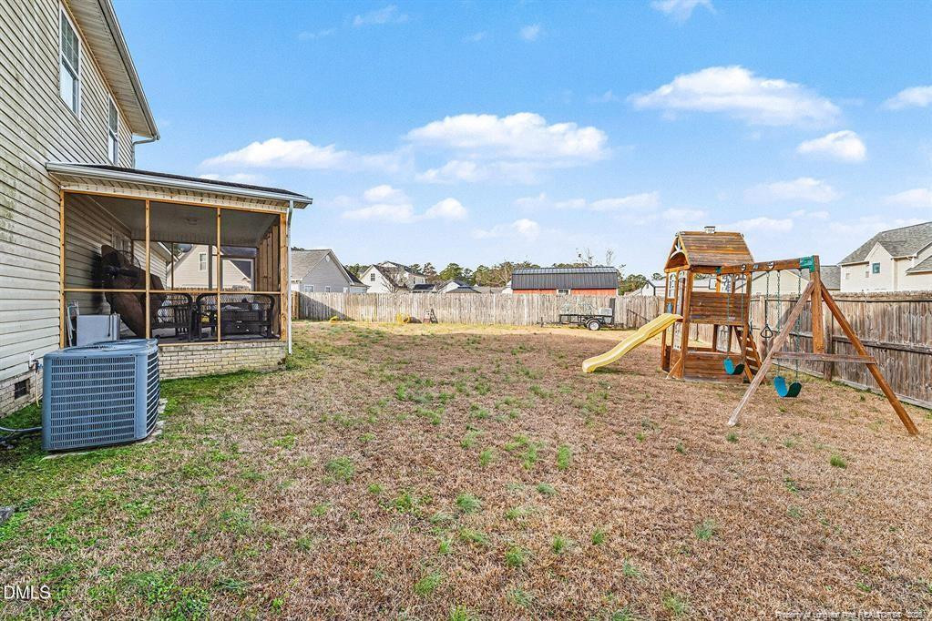 831 Raspberry Road Stedman, NC 28391 - Photo 34 of 35 a view of a terrace with chairs