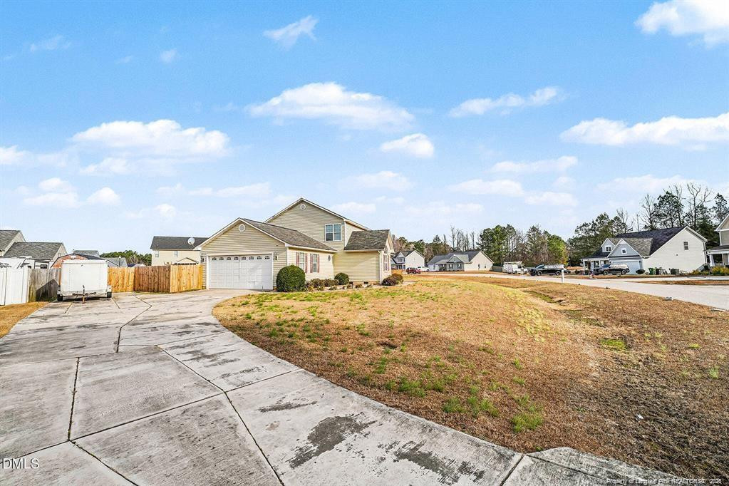 831 Raspberry Road Stedman, NC 28391 - Photo 35 of 35 a view of a house with a yard