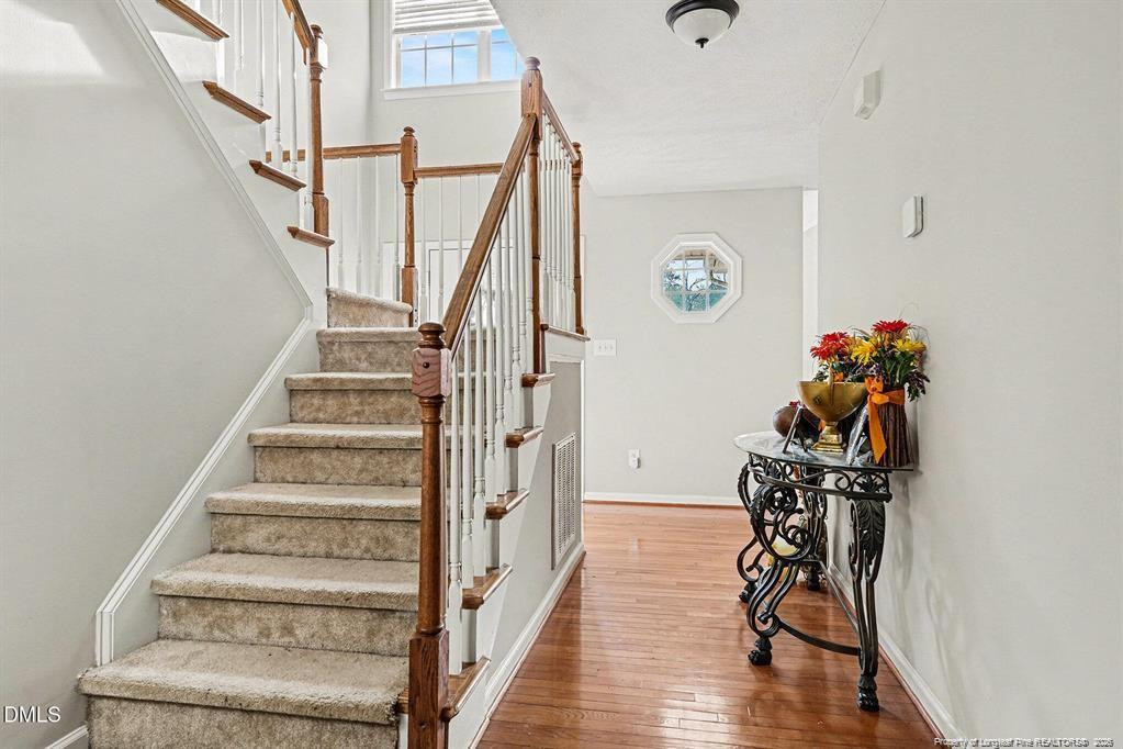 831 Raspberry Road Stedman, NC 28391 - Photo 6 of 35 a view of entryway with wooden floor