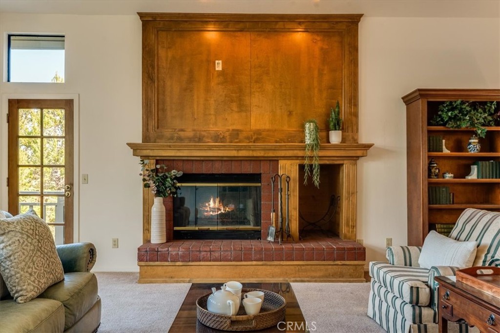 3171 Rogers Road Cambria, CA 93428 - Photo 11 of 73 a living room with furniture and a fireplace