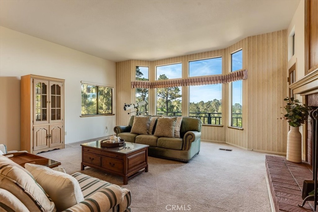 3171 Rogers Road Cambria, CA 93428 - Photo 13 of 73 a living room with furniture and a large window