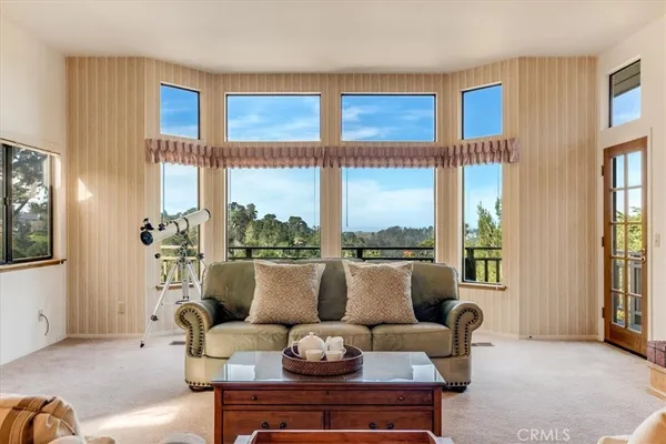 a kitchen with stainless steel appliances a stove a sink and a microwave