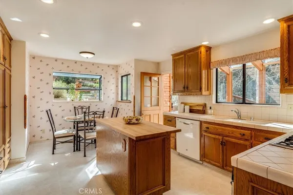 a spacious bedroom with a bed and a window