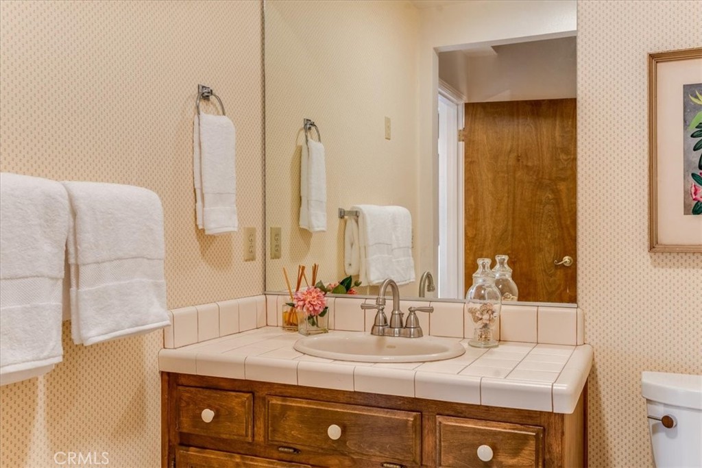 3171 Rogers Road Cambria, CA 93428 - Photo 34 of 73 a bathroom with a sink and a mirror