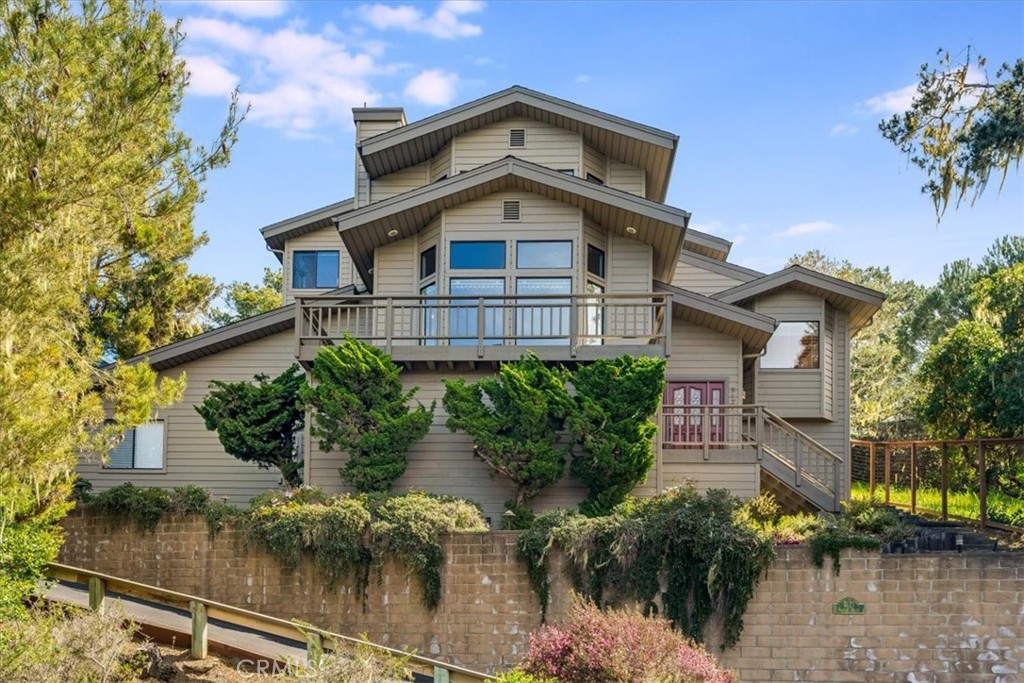 3171 Rogers Road Cambria, CA 93428 - Photo 4 of 73 a view of a house with a yard