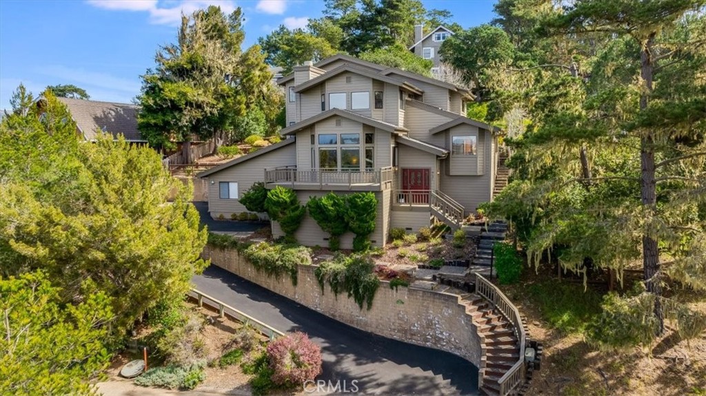 3171 Rogers Road Cambria, CA 93428 - Photo 70 of 73 a front view of a house with a yard