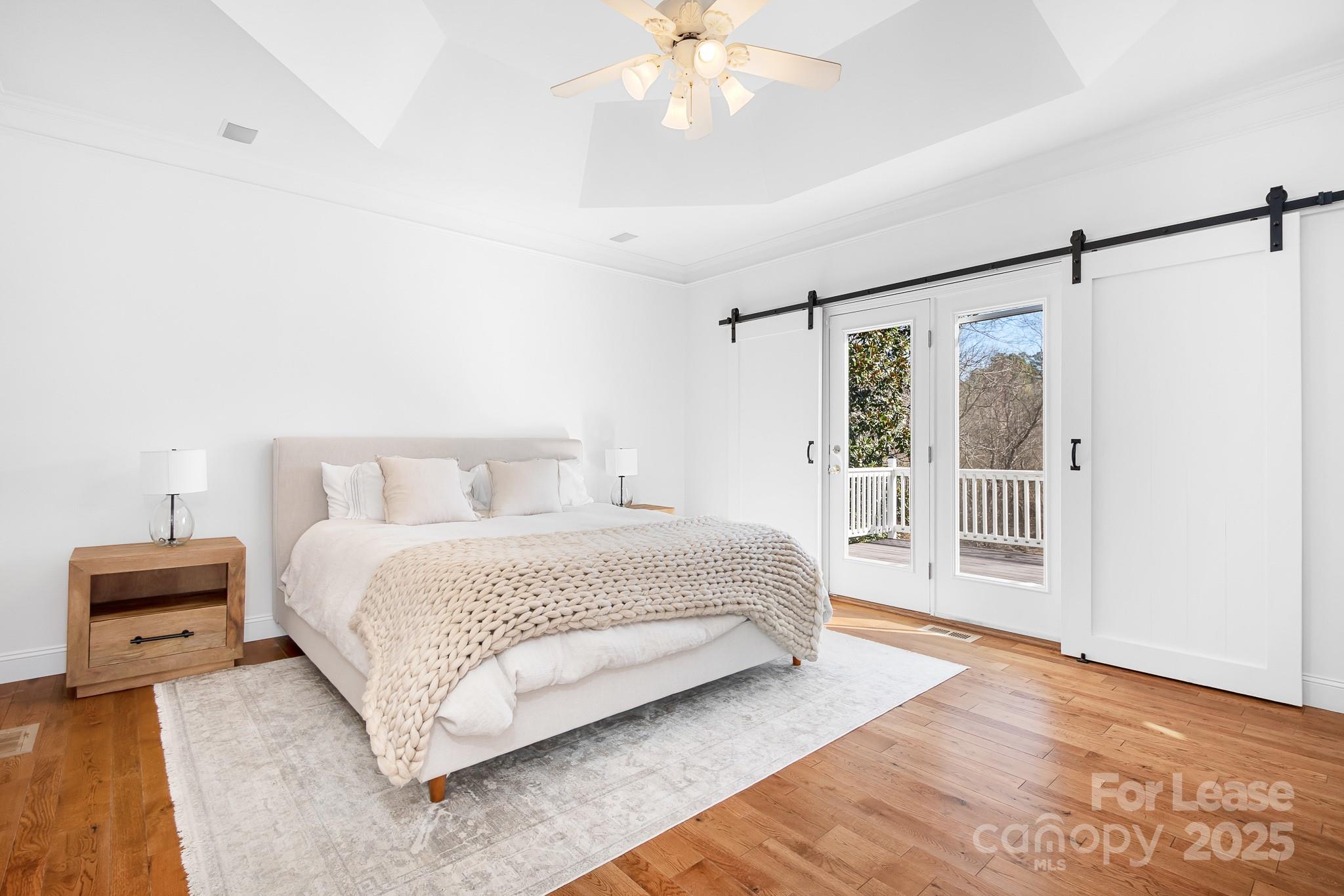 7277 Willowbrook Drive Denver, NC 28037 - Photo 18 of 33 a bedroom with a large bed and a window