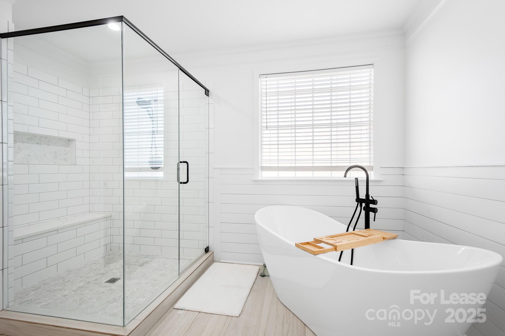 7277 Willowbrook Drive Denver, NC 28037 - Photo 19 of 33 a bathroom with a shower and a bathtub