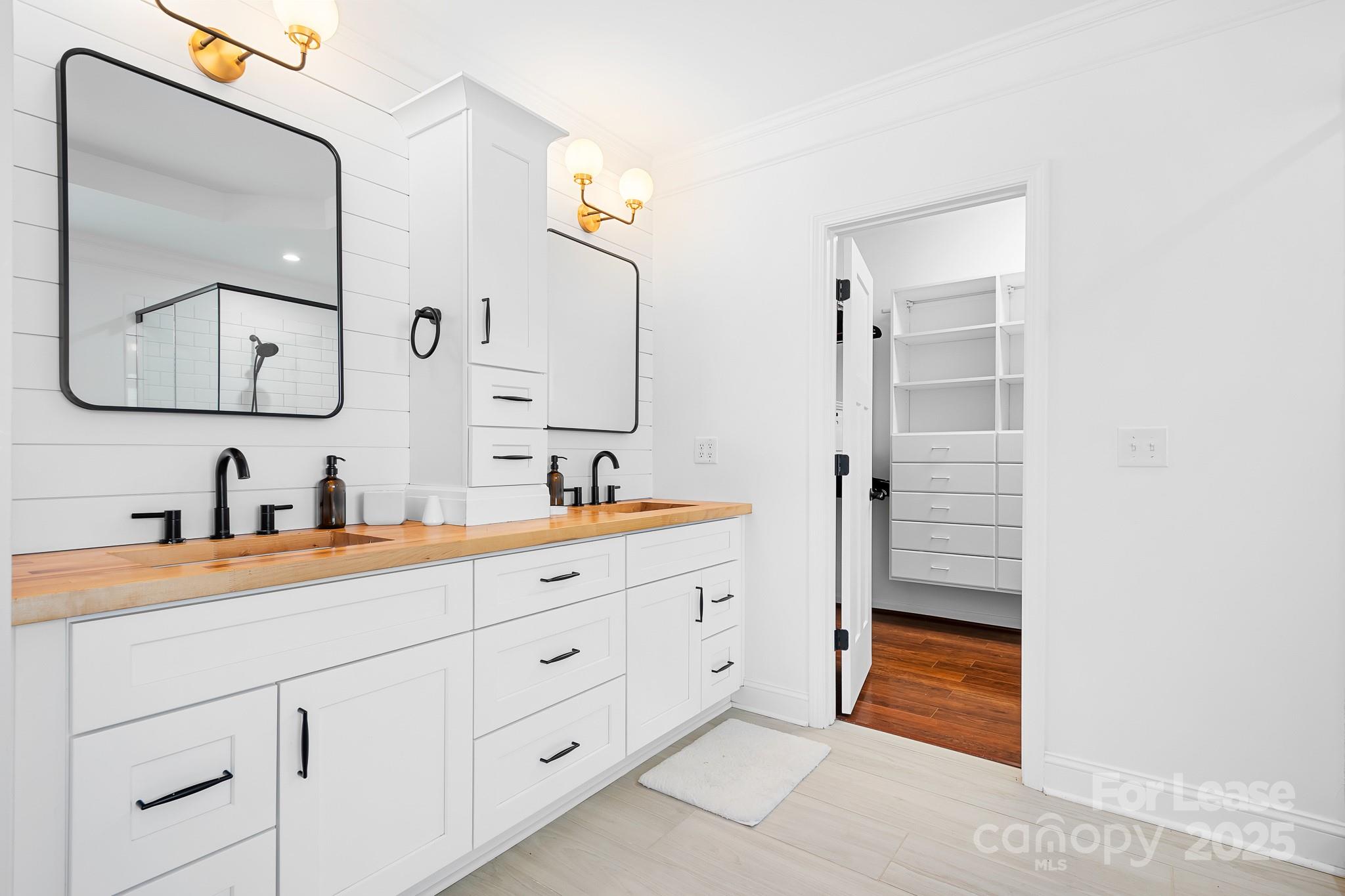 7277 Willowbrook Drive Denver, NC 28037 - Photo 20 of 33 a spacious bathroom with double sink and a mirror