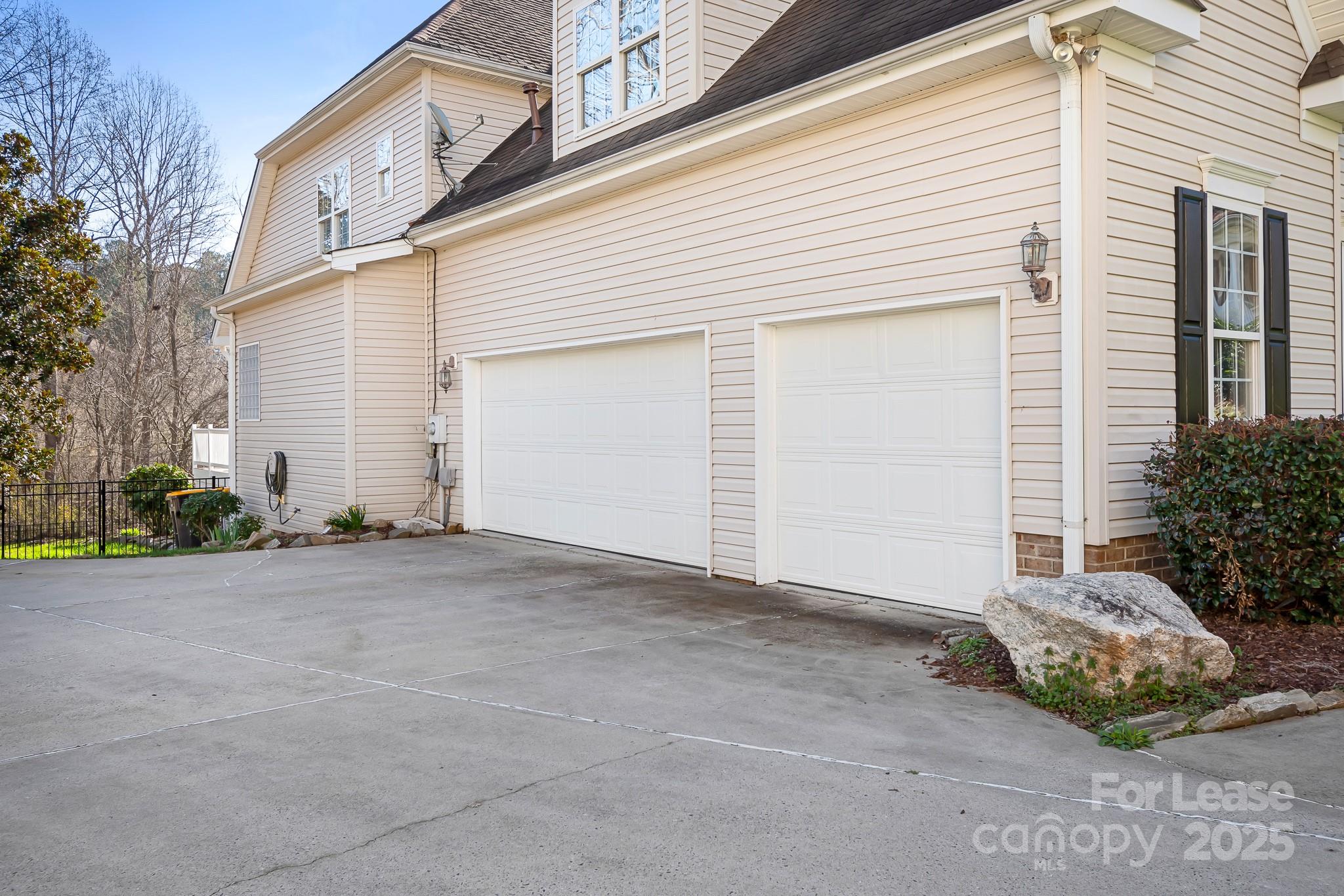7277 Willowbrook Drive Denver, NC 28037 - Photo 3 of 33 a view of a house with garage