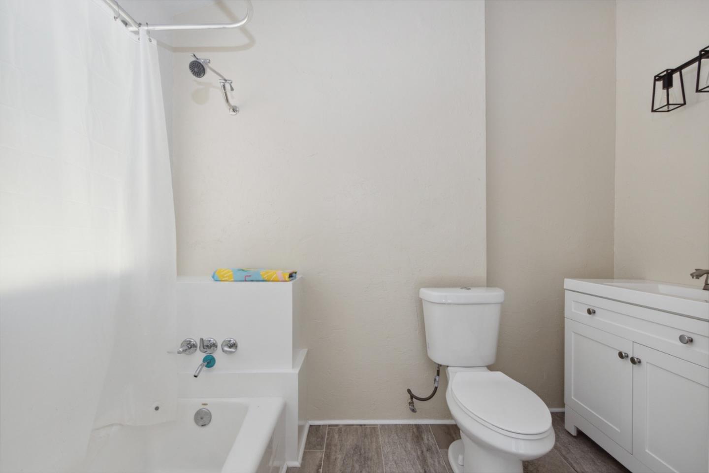 520 Laguna Creek Road Los Gatos, CA 95033 - Photo 16 of 75 a white toilet sitting next to a bath tub