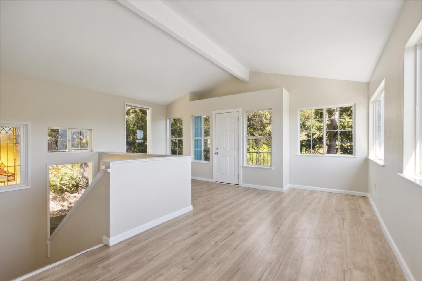 520 Laguna Creek Road Los Gatos, CA 95033 - Photo 17 of 75 wooden floor in an empty room with a window