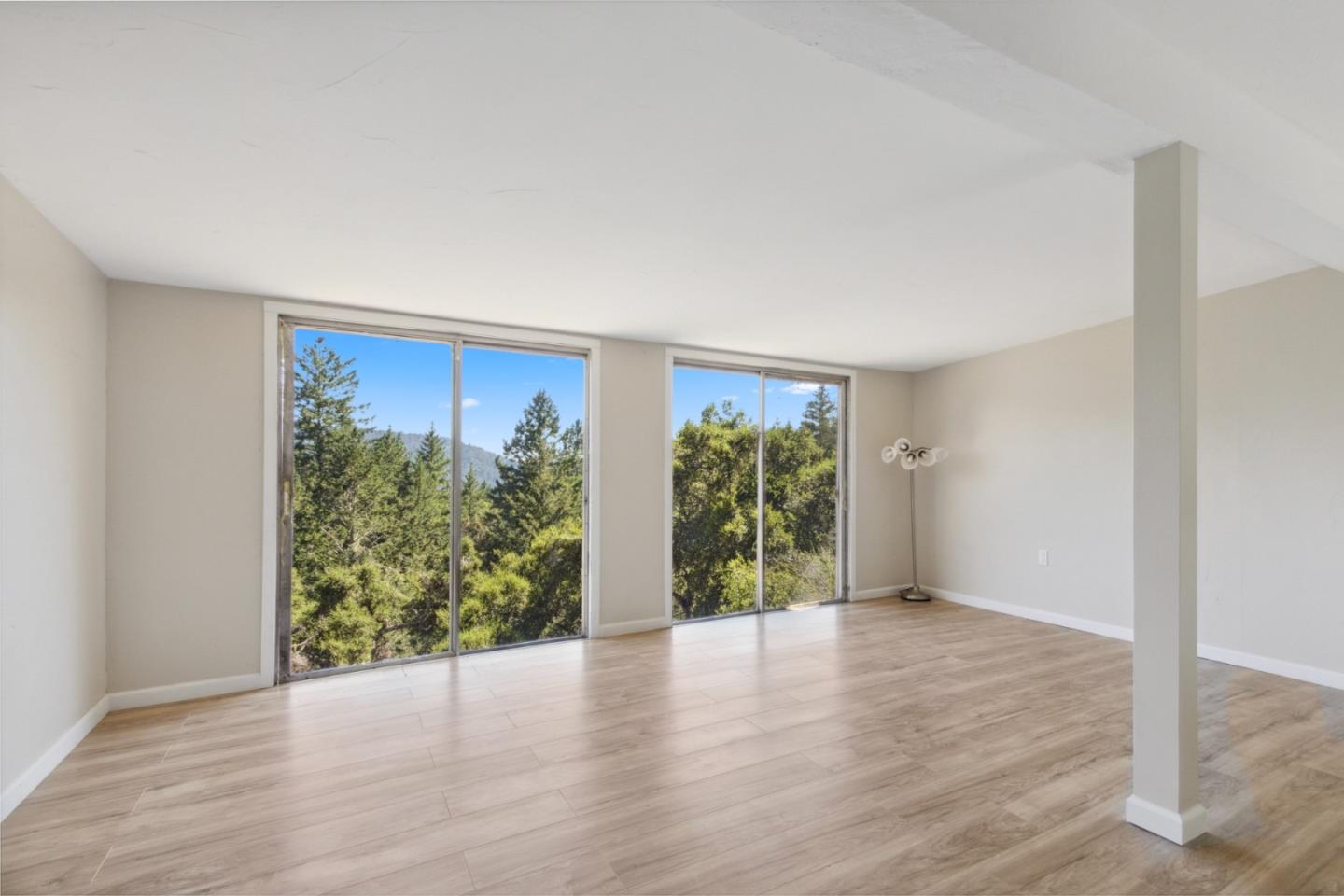 520 Laguna Creek Road Los Gatos, CA 95033 - Photo 2 of 75 a view of an empty room with wooden floor and a window