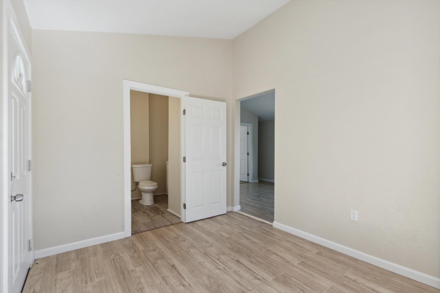 520 Laguna Creek Road Los Gatos, CA 95033 - Photo 24 of 75 a view of an empty room with wooden floor and closet