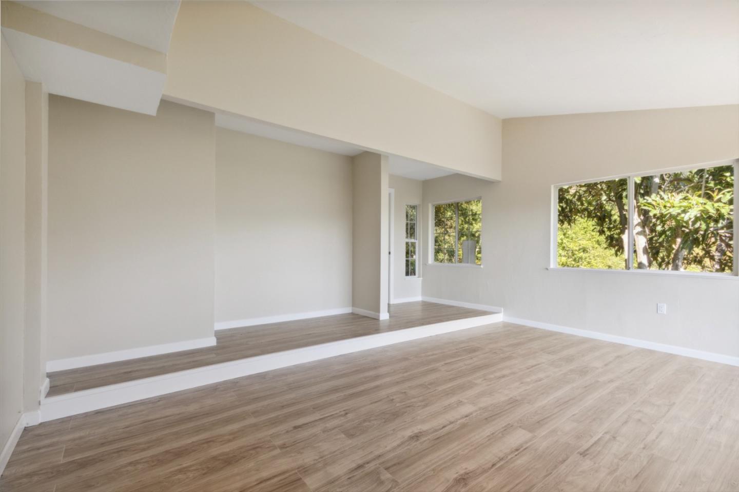 520 Laguna Creek Road Los Gatos, CA 95033 - Photo 32 of 75 a view of an empty room with window and wooden floor