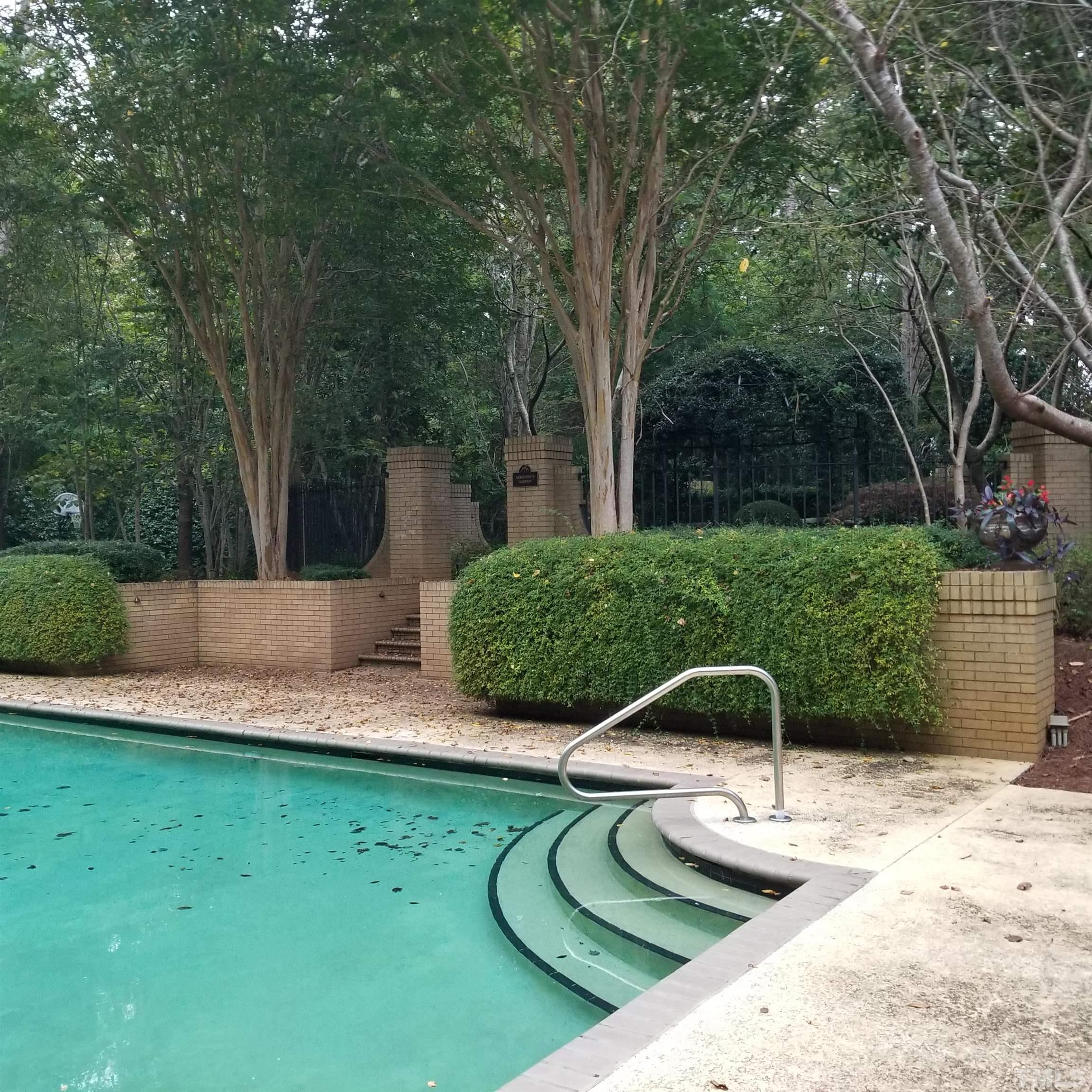1633 Morning Mountain Road Raleigh, NC 27614 - Photo 7 of 74 a view of a swimming pool with a patio