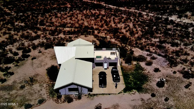 a buildings covered with snow in the background