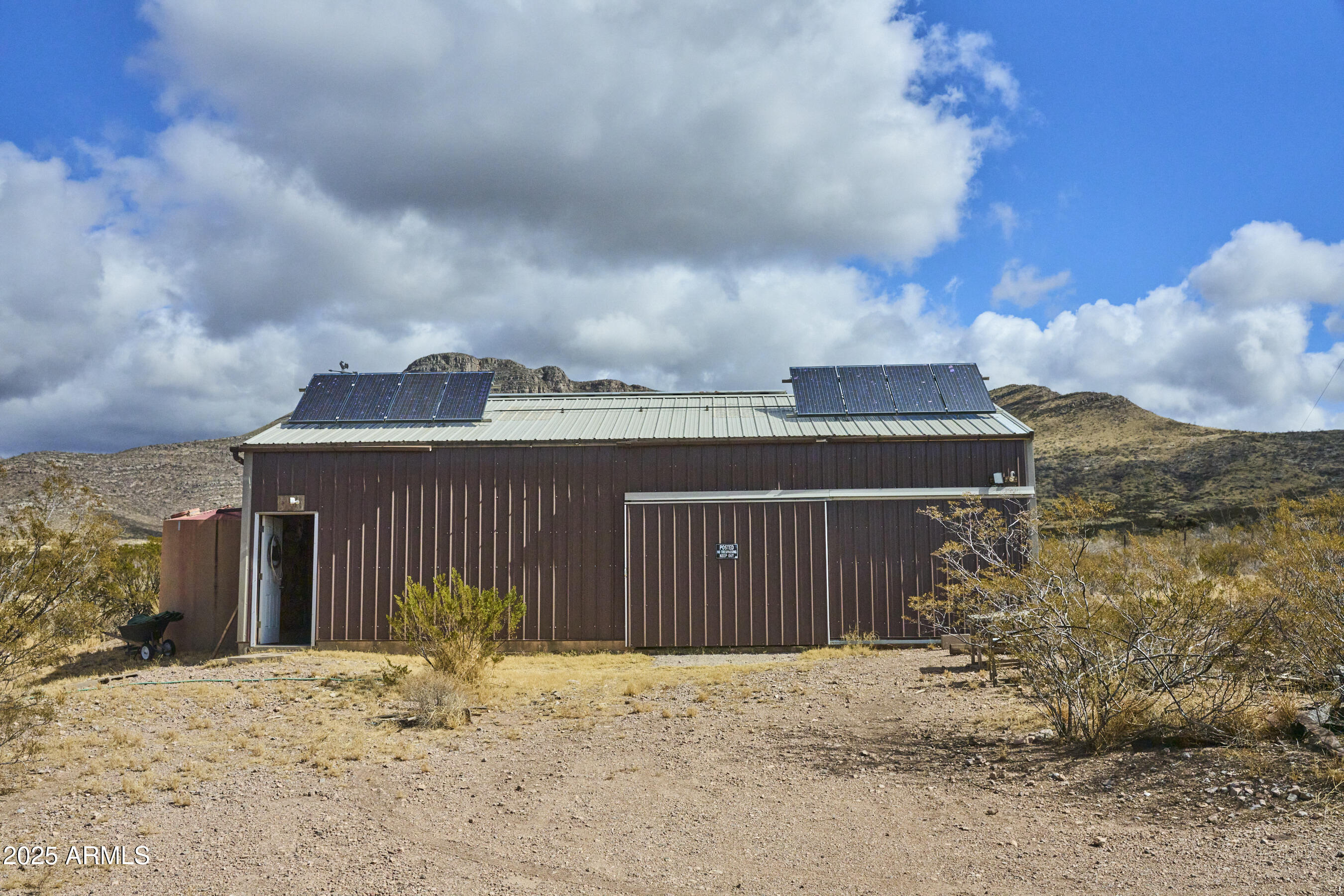 Undisclosed Address Bisbee, AZ 85603 - Photo 15 of 78 a front view of a house with a yard