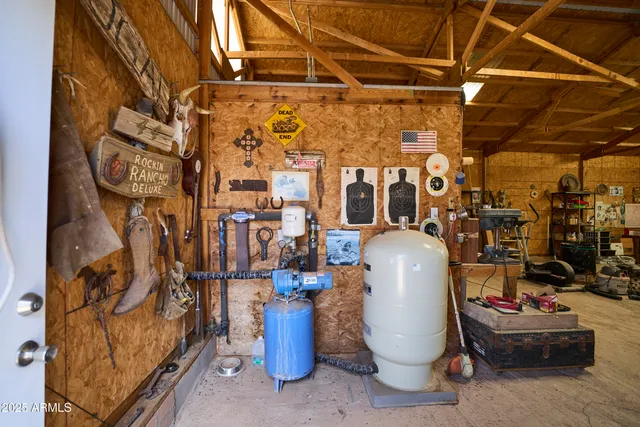 a kitchen with stainless steel appliances a refrigerator sink and cabinets