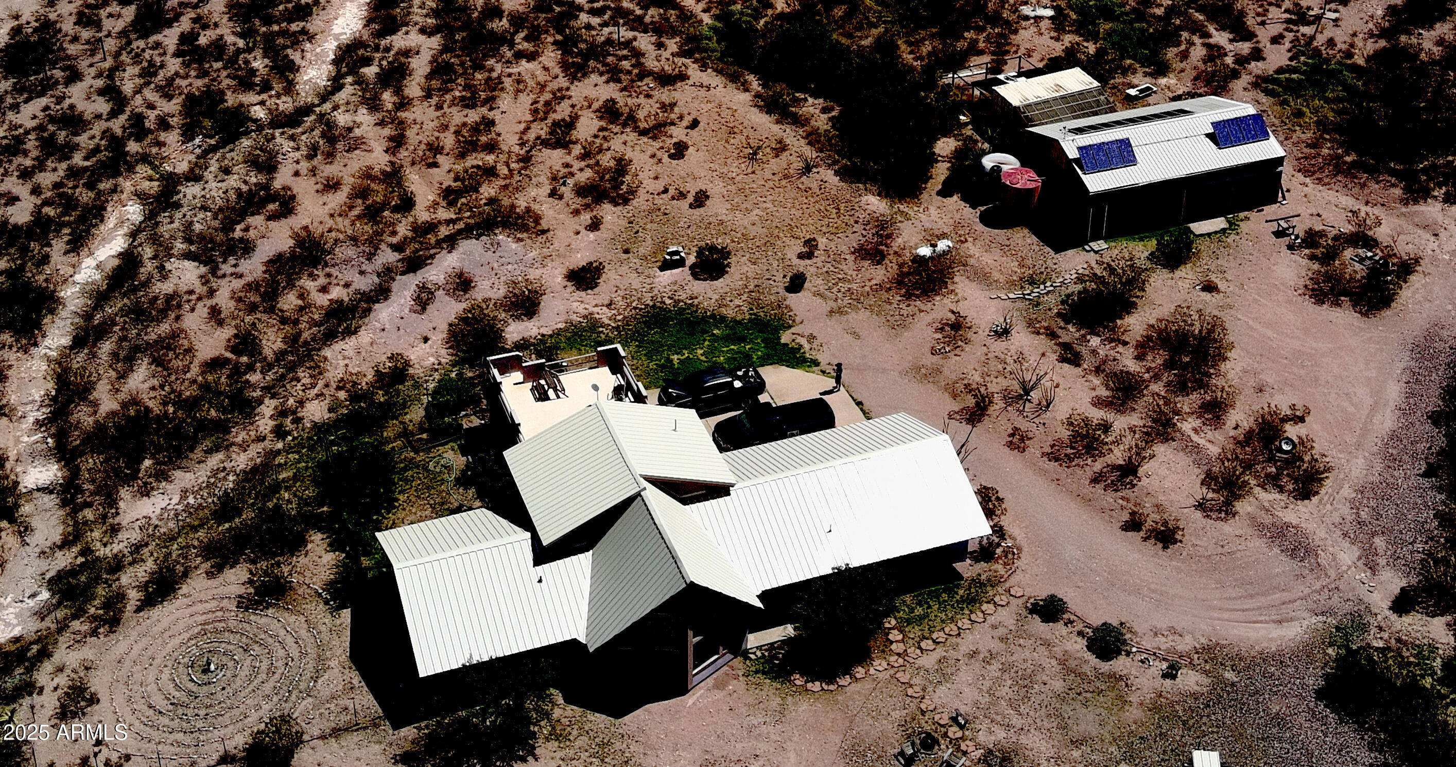 Undisclosed Address Bisbee, AZ 85603 - Photo 2 of 78 a picture of a table and chairs with mountain view