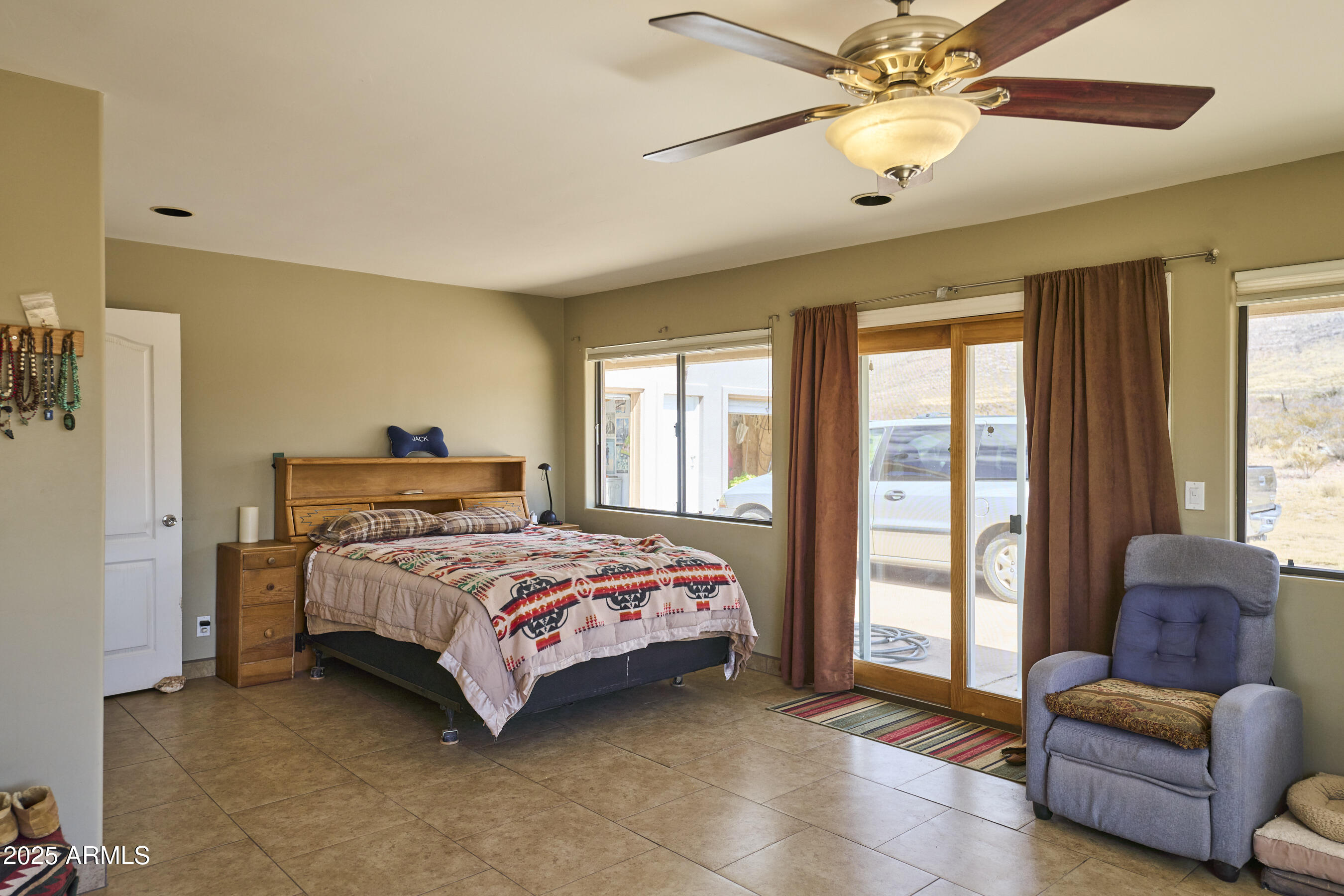 Undisclosed Address Bisbee, AZ 85603 - Photo 26 of 78 a bedroom with a bed and a couch