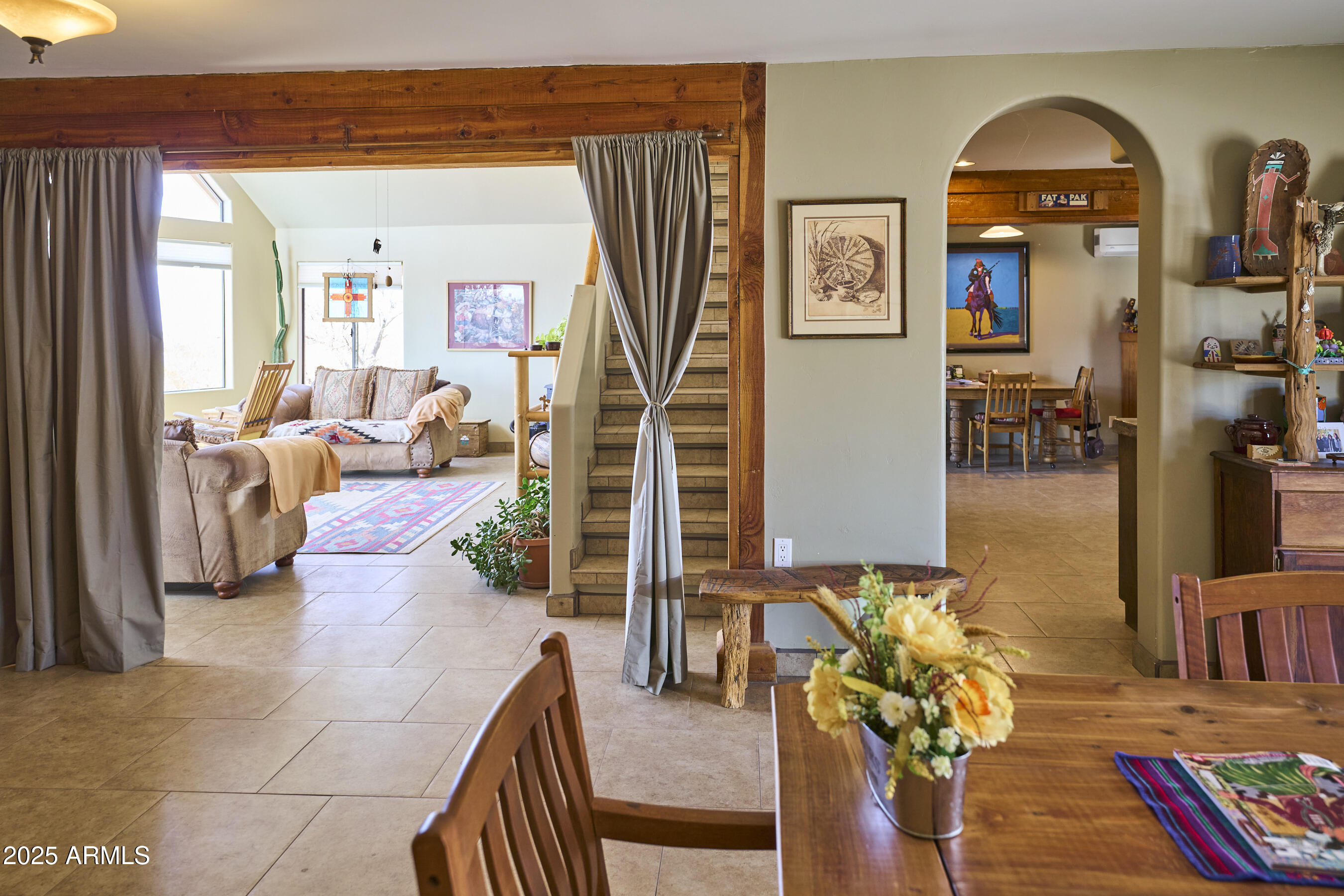 Undisclosed Address Bisbee, AZ 85603 - Photo 30 of 78 a living room with furniture a rug and a large window