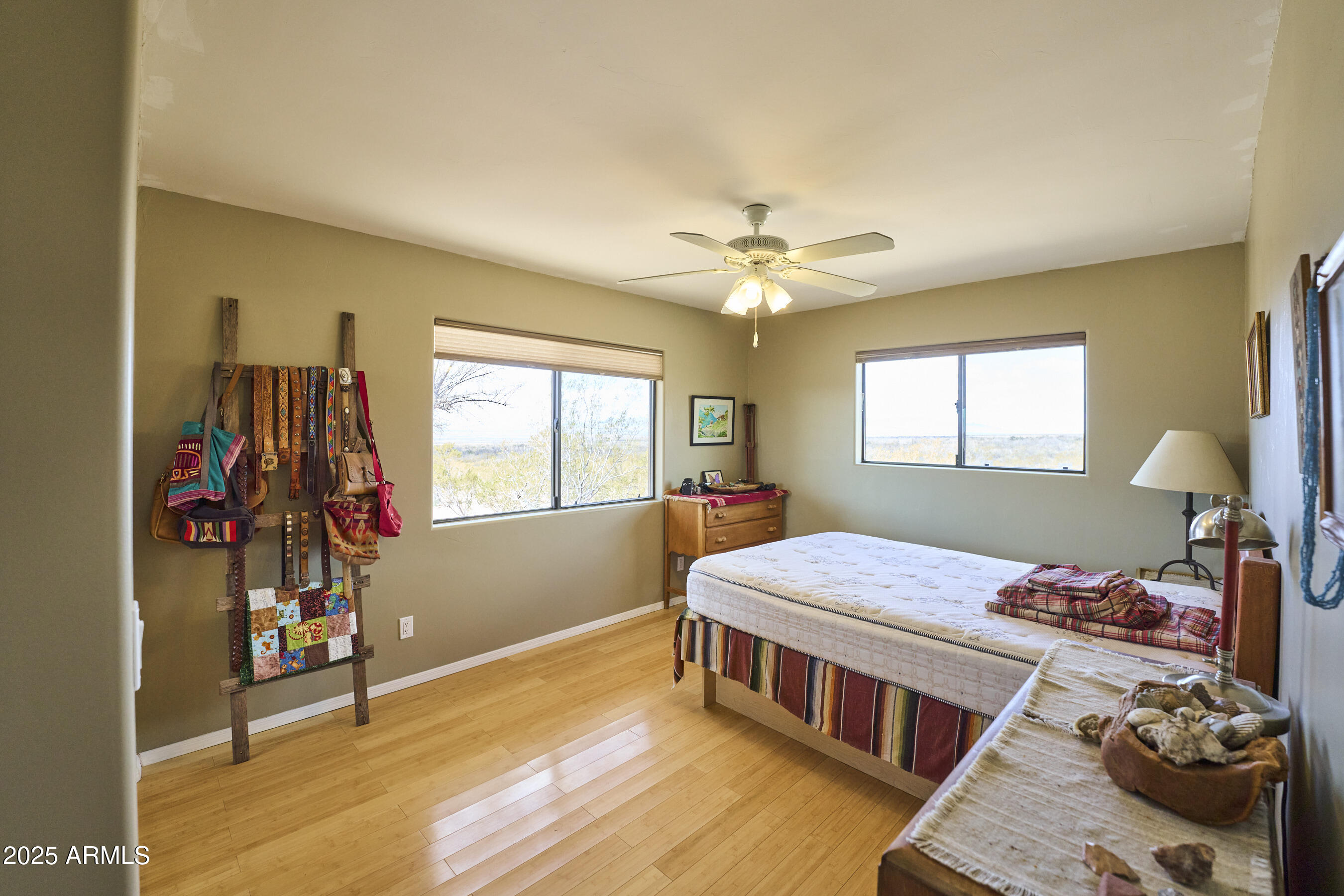 Undisclosed Address Bisbee, AZ 85603 - Photo 37 of 78 a bedroom with furniture and a window