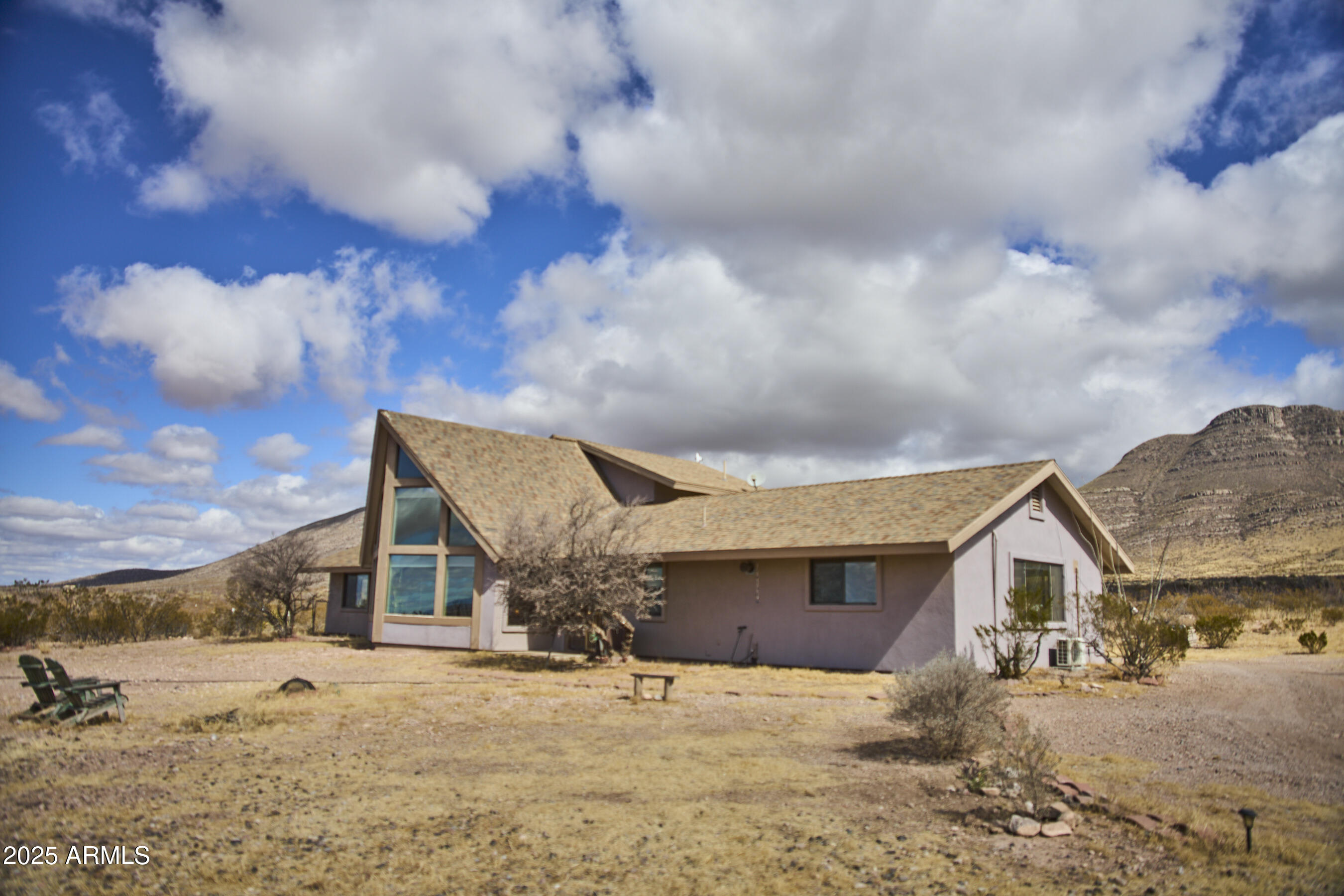 Undisclosed Address Bisbee, AZ 85603 - Photo 54 of 78 front view of a house with a yard